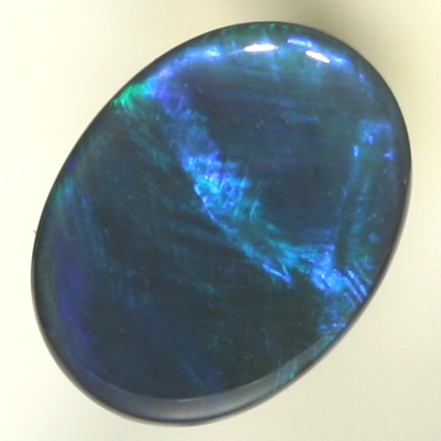 SOLID BLACK OPAL Sheen pattern of turquoise to green to ocean blue